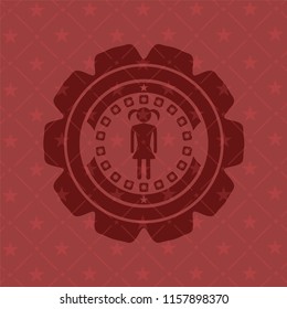 girl icon inside red emblem