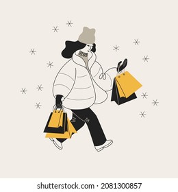 Girl in a jacket with shopping bags