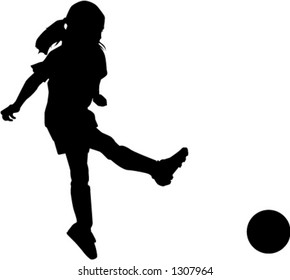 girl kicking soccerball