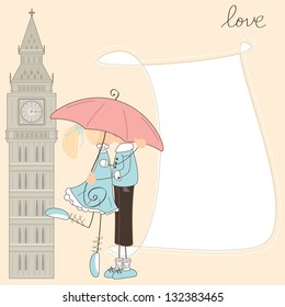 Girl kiss boy under umbrella in London