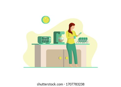 A girl in the kitchen checking her phone