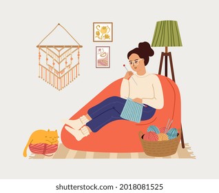 Girl knit. Knitting clothes, woman relaxing in big chair. Cozy scandinavian interior with young female and cat, season greetings vector card print