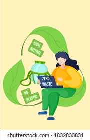 Girl with a laptop in her hands sits on the green recycling logo and works or studies on her computer. Recycling garbage and unnecessary things. Natural products and waste-free production. Environment