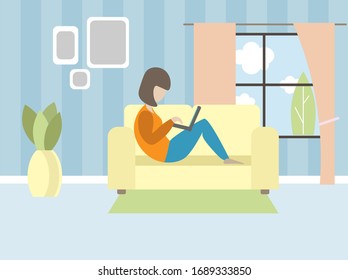 girl with a laptop lies on a sofa in the house.  stay at home for quarantine.  freelancer work. woman working at home.