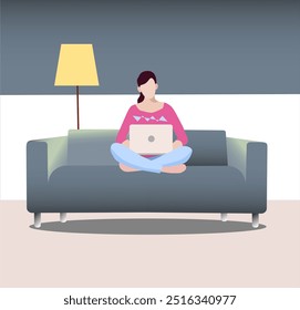 girl with laptop on sofa in cozy room