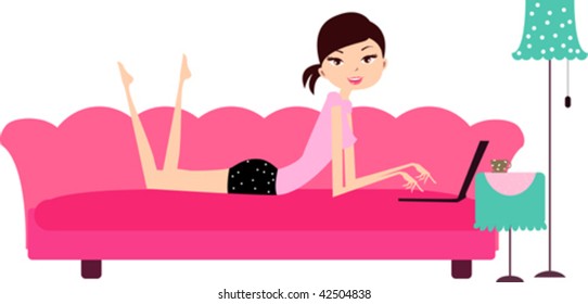 girl with laptop relaxing at home