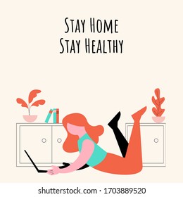 Girl laying on the floor with laptop, quarantine concept