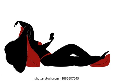 The girl lies on a large pillow and reads a book. Woman in a swimsuit in silhouette style. Black on a white background.