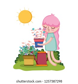 girl lifting houseplant with sprinkler in the garden