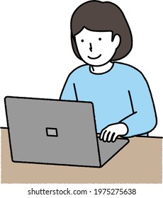 Girl in light blue clothes using a computer