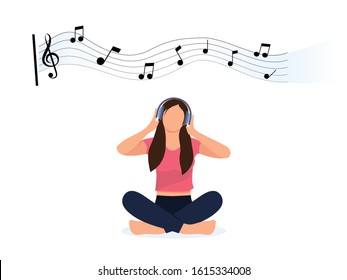 Girl listening music sitting on the floor.  Young woman in headphones listening to music. Concept of internet online radio streaming listening. Music applications, playlist online songs.