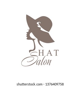 Girl in a little hat. Fashionable Hat Salon.