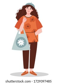 A girl with long curly hair holds an eco bag. Stylish clothes in natural colors in the Korean style.Design for banner, posters, cards etc. Vector illustration.Scandinavian style .Minimalisn . Nature .