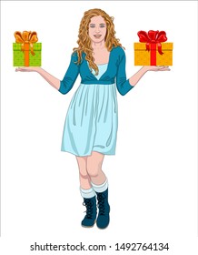 Girl with long red hair stands and holds gift boxes on the palms