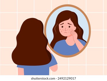 Girl looking in a bathroom mirror. Problem face skin with acne.