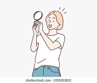 girl looking through a magnifying glass. Hand drawn style vector design illustrations.