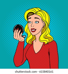 Girl looks in makeup mirror pop art retro vector illustration. Comic book style imitation.