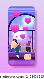 girl in love using laptop social media communication happy valentines day celebration concept living room interior with pink hearts