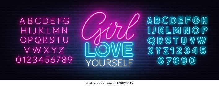 Girl Love Yourself neon quote on a brick wall.