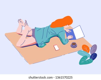 The girl is lying on the floor working, playing games, social networking, on holidays. Wearing a shirt in her house decorated with trees With coffee.flat design style vector graphic illustration.