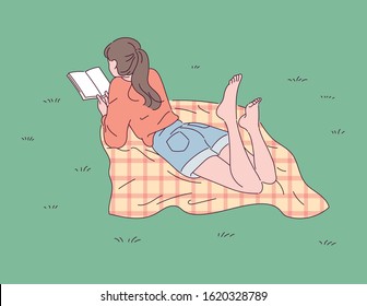 A girl is lying on the lawn of a park and reading a book. hand drawn style vector design illustrations. 