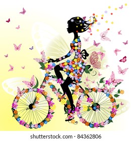 Girl on a bicycle in a romantic