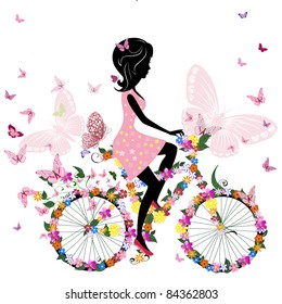 Girl on a bicycle with a romantic butterflies