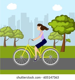 Girl on bike in park