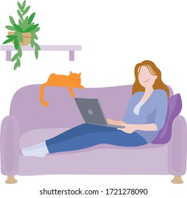 Girl on the couch. Work at home. Office at home. Cat next to a girl