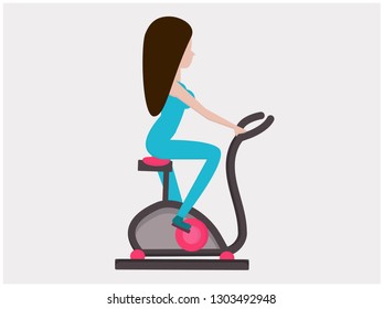 Girl on the exercise bike
