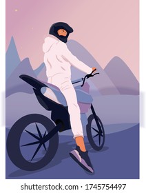 Girl on a motorcycle at sunset
