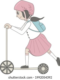 Girl on a scooter goes to school