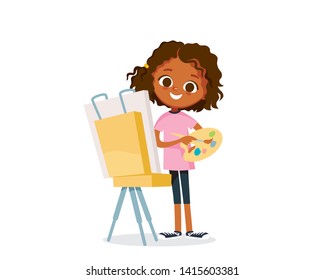 Girl painting  draws picture and oil paints standing and palette in front an easel 