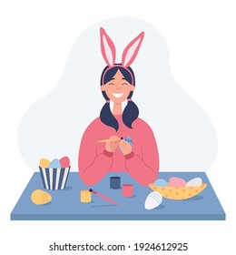 A girl painting Easter eggs. Girl wearing bunny ears on Easter day.  Flat vector illustration on a white background.
