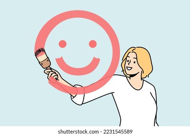 Girl paints smiling face with brush and red paint on glass in front of her. Blonde young woman spreading positive vibes, emotions. Painter have fun. Optimistic lady. Dont worry, be happy vector.