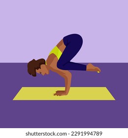 The girl performs an exercise - a handstand.
