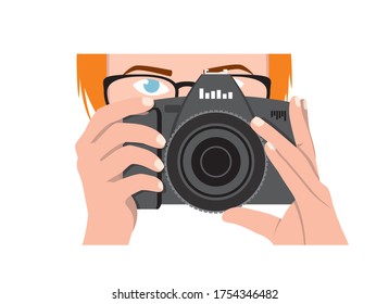 A Girl Photographer With Orange Hair, Blue Eyes Holds A Black Camera And Looks Forward. Vector Drawing Of A Woman Photojournalist On A White Background