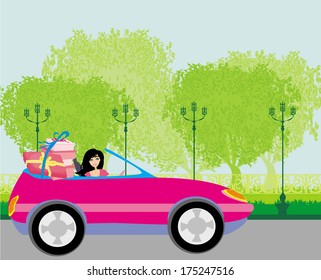 Girl in a pink convertible with gifts