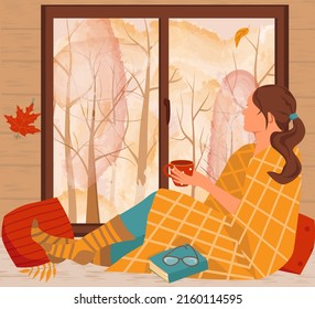 A girl in a plaid, with a mug of coffee, is sitting on the windowsill and looking out the window. Outside the window is an autumn landscape. Cozy autumn. Vector illustration in flat style