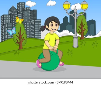 Girl playing bouncing ball in the park