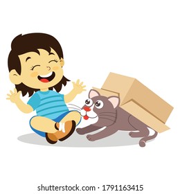 girl playing with cat in cardboard