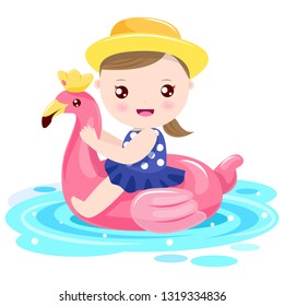 Girl playing with flamingo swim ring