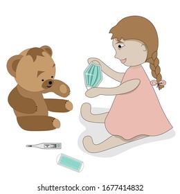 Girl is playing with her Teddy Bear. She is going to put it on medical  face mask to protect it from coronavirus.
