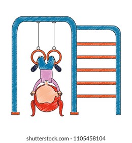 girl playing in park playground rings hanging