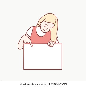 Girl points to a blank sheet. A young woman holds a bullet leaf in her hands. Hand drawn style vector design illustrations.