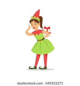 Girl In Pointy Shoes With Gift Dressed As Santa Claus Christmas Elf For The Costume Holiday Carnival Party