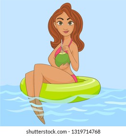 Girl in pool drinking from a coconut