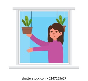 girl with potted plants in the window