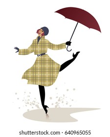 Girl in raincoat and umbrella jumping and dancing on a puddle