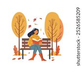 Girl Reading Book on Bench in Autumn Park